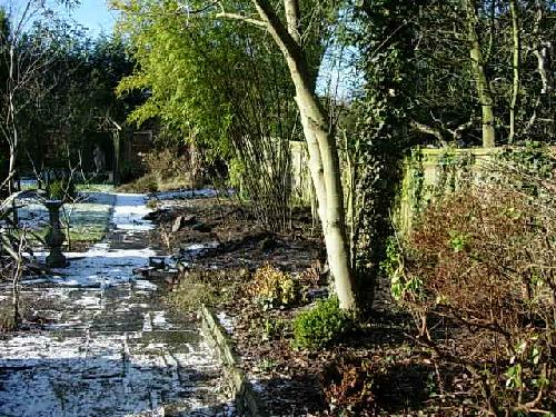 The Long Border looking down towards the pergola