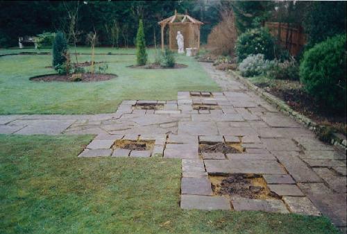 Areas for planting in the path - with the first pergola in the distance